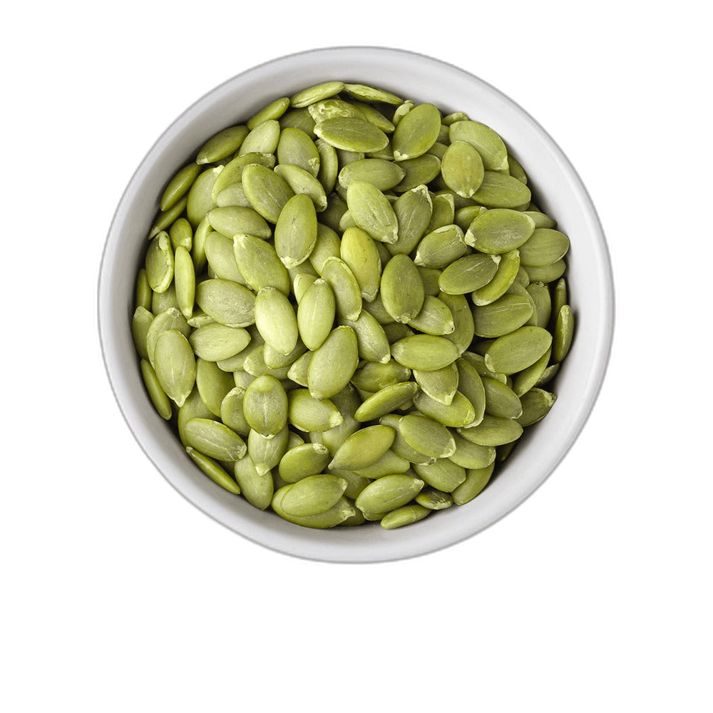 Natural Green Pumpkin Seeds In White Bowl